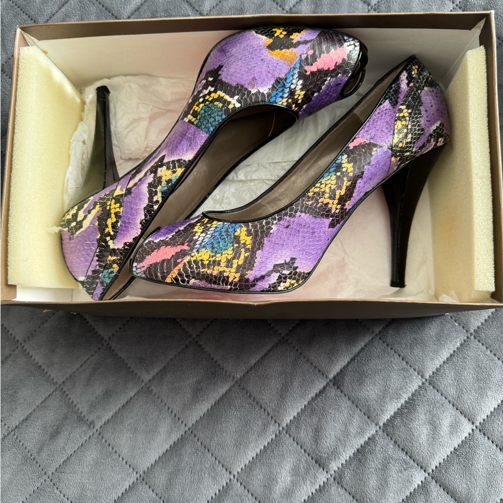 Slightly worn. Printed Snake